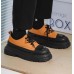 Мужские оранжевые броги с эко кожи и черным круглым носком