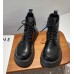 Черные ботинки со шнуровкой на толстой ровной подошве