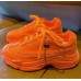 Оранжевые женские кроссовки летние на грубой подошве
