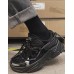Массивные кроссовки со шнурками и с вставками - полностью черные