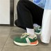 Модные женские кроссовки зеленые с белой полоской
