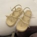 Вінтажні сандалі-в'єтнамки на грубій підошві молочні