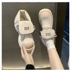 Стильні короткі ботинки з заворотом міу на високій підошві бежеві